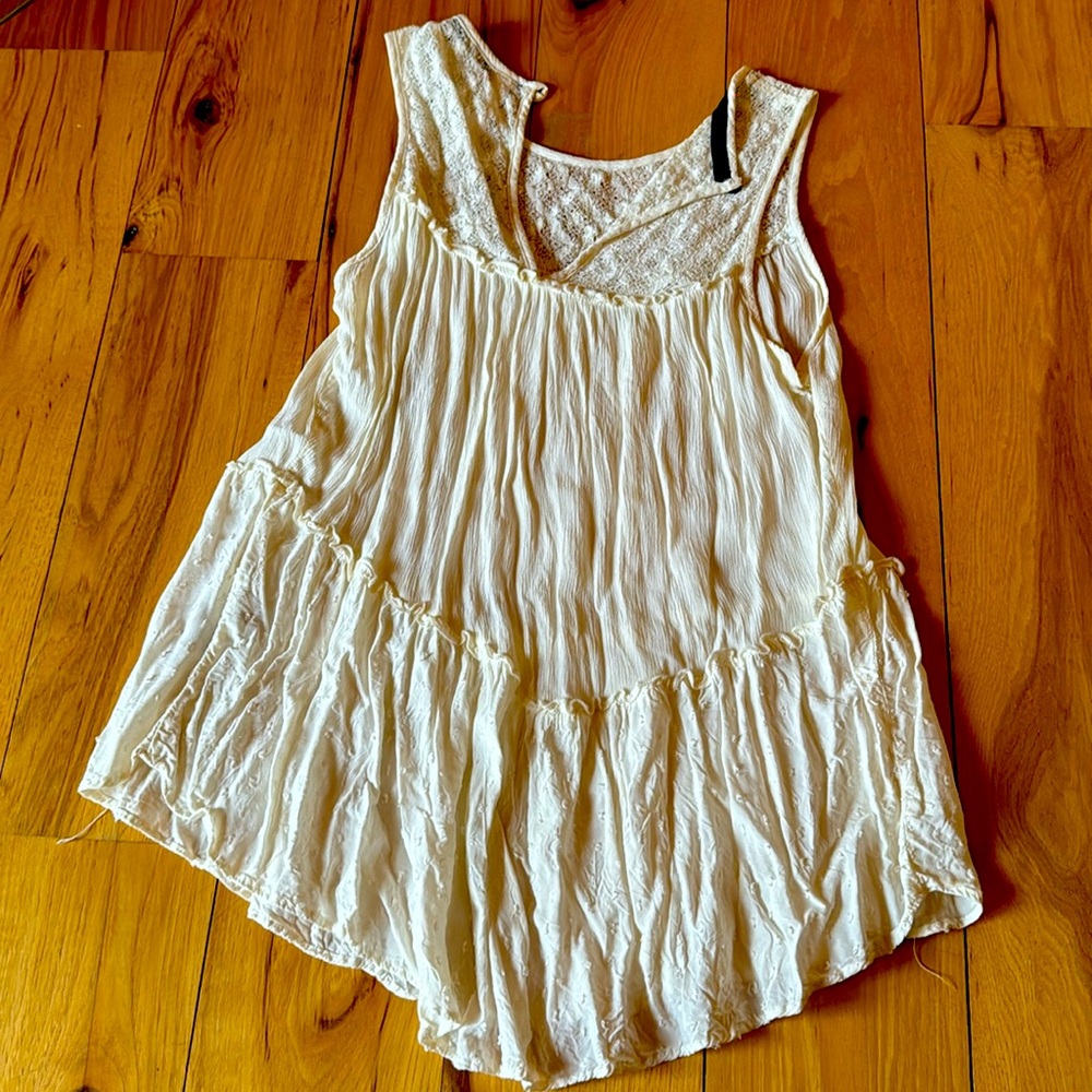 Brand xhilaration size medium the color is off white/cream